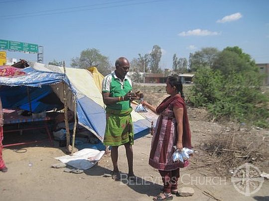 Women’s Fellowship Distributes Food to Beggars on Founder’s Day