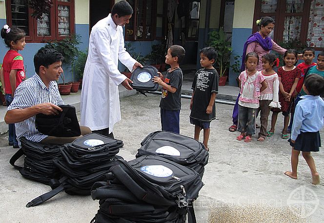 Diocese of Pokhara Gifts New School Bags to 100 Bridge of Hope Children